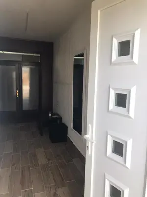 an empty room with a door and a hallway at Smeštaj Filipović in Soko Banja