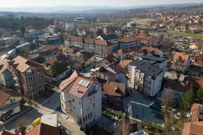 an aerial view of a town with buildings at Apartman Alegro in Soko Banja