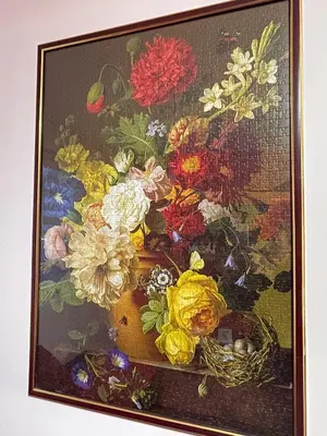 a painting of a vase with flowers in it at Una in Vrnjačka Banja