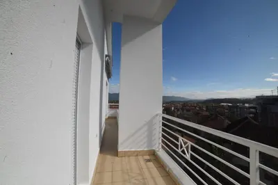 a balcony with a view of a city at Panoramske Vile in Vrnjačka Banja