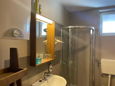 a bathroom with a sink and a shower at 
