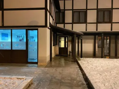 an empty building with glass doors and windows at 