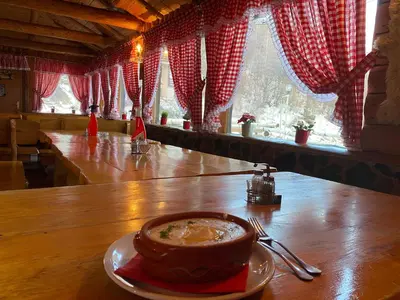 a bowl of soup on a table in a restaurant at 