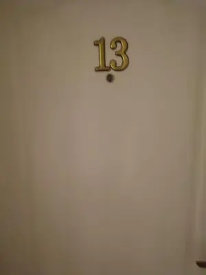 a clock on a wall with the number on it at Smeštaj Ćirković in Vrnjačka Banja