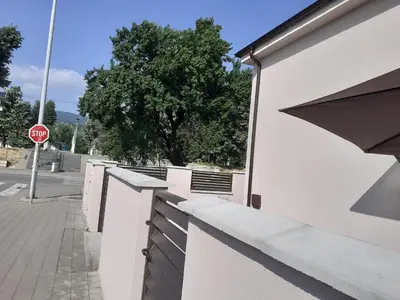 a stop sign on the side of a building at Apartman Nena in Pirot