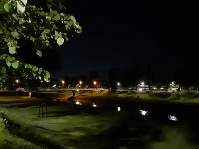 a park at night with lights and a golf course at Apartman Nena in Pirot