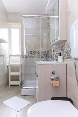 a bathroom with a shower and a sink at Panorama Lux in Soko Banja