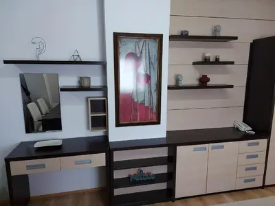 a dressing room with a mirror and a dresser at Mila apartmani Kopaonik in Kopaonik