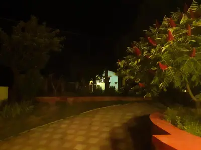 a night time picture of a driveway at Village house Moo Moo in Vranje