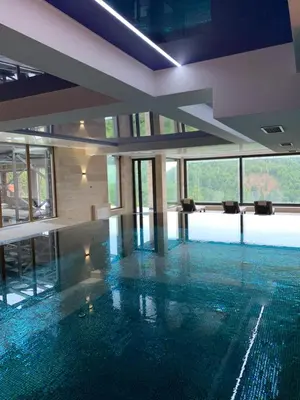 an empty swimming pool with a large floor of water at Silver View in Kopaonik