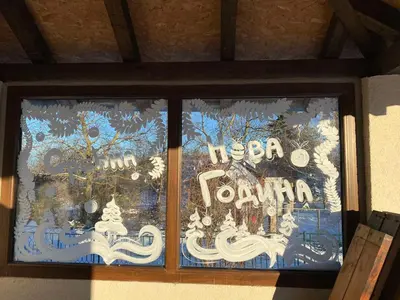 a window with a sign that says hello torana at Vikendica Matić in Goč
