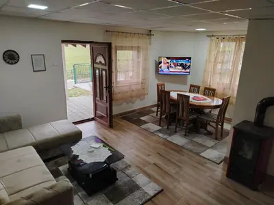 a living room with a couch and a table at Vikendica Matić in Goč