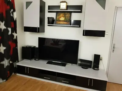 a living room with a large flat screen tv at FARAON pn 3 in Paraćin