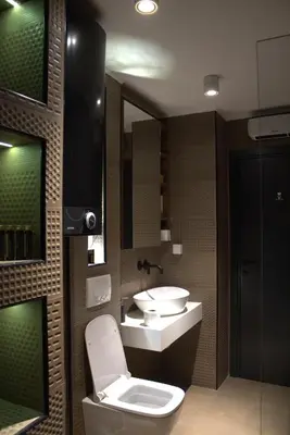 a bathroom with a toilet and a sink at Elite Space in Niš