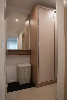 a bathroom with a toilet and a walk in shower at Apartman Sandra Free parkig in Vrnjačka Banja