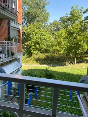 a view of a yard from a balcony at Apartman Sandra Free parkig in Vrnjačka Banja