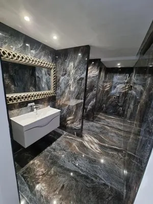 a bathroom with a sink and a mirror at Sky apartmani & spa-Vip Lux DOO in Leskovac