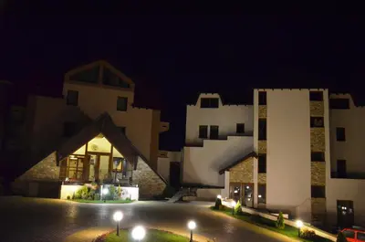 a view of a building at night at Milmari - Breakfast and pool in Kopaonik