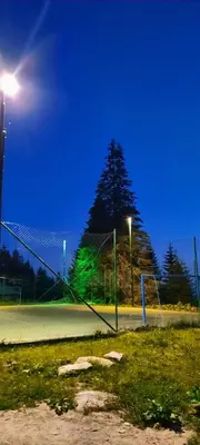 a soccer field at night with a goal at Studios Šumska Kuća 1 in Kopaonik