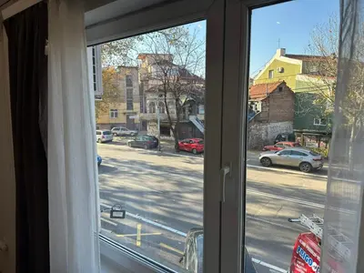 a window with a view of a city street at Mikasa in Niš