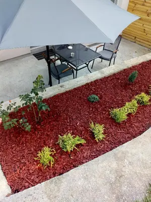 an overhead view of a patio with a table and plants at Apartmani MIBOR in Vrnjačka Banja