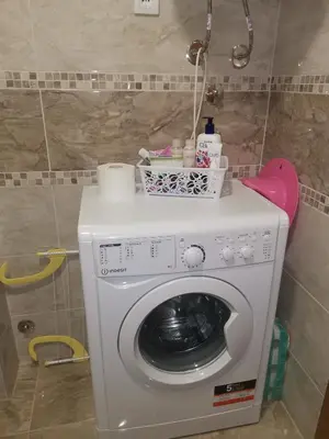 a washing machine with a basket on top of it at Bellavista in Vrnjačka Banja