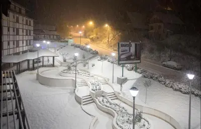 a skate park covered in snow at night at BRZECE SKI GONDOLA & FREE PARKING apartment in Kopaonik