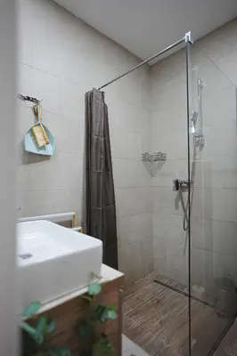 a bathroom with a shower and a sink at VitaDea Milmari Kopaonik in Kopaonik