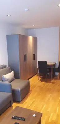 a living room with a couch and a table at Bela Jela - Brzeće, Kopaonik in Brzeće