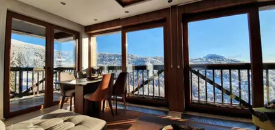 a living room with a view of the mountains at Vista47 Zoned II Kopaonik in Kopaonik