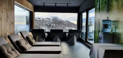 a living room with a view of a mountain at Vista47 Zoned II Kopaonik in Kopaonik