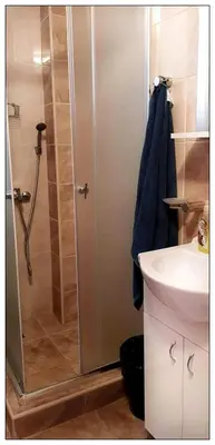 a bathroom with a shower and a sink at Sky Apartman 202 in Kopaonik