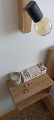 a table with a lamp on top of it at Apartman MonTanja Kopaonik, u hotelu Kraljevi Čardaci in Kopaonik