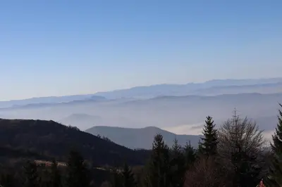 a view of the mountains and clouds in thedistance at Apartman Snesko Zoned in Kopaonik