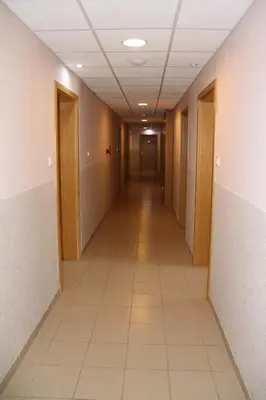 an empty hallway in an office building at Apartman Snesko Zoned in Kopaonik