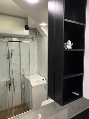 a bathroom with a glass shower and a toilet at Aleksinac in Aleksinac