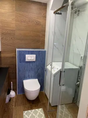 a small bathroom with a toilet and a shower at Aleksinac in Aleksinac