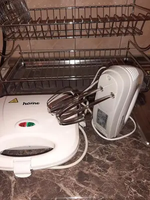 a white toaster sitting on top of a toilet at Anka in Jagodina