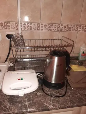 a kitchen counter with a tea pot and a toaster at Anka in Jagodina
