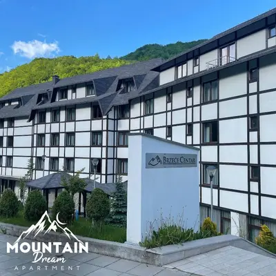 a building with a sign in front of it at Fully Equiped, Quiet, for 5 persons, Next To Panoramic Gondola in Brzeće