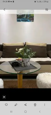 a living room with a couch and a coffee table at ANASTASIJAKOP in Kopaonik