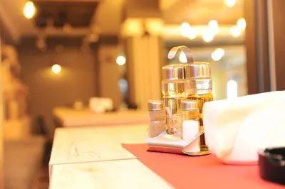 a bottle of oil sitting on top of a counter at Milmari Future Gold Apartmani Kopaonik in Kopaonik