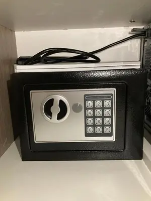 a toaster oven with a cord plugged into it at Ivkovic spa Milmari N16 in Kopaonik