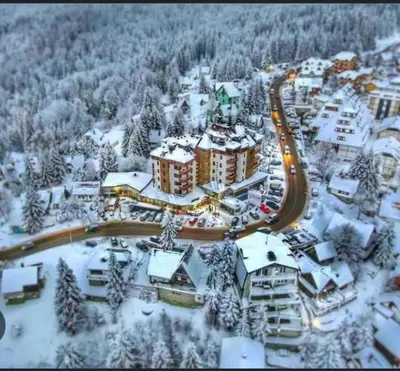 an aerial view of a resort in the snow at Mujen Lux Tutic - Free Spa & Wellness in Kopaonik