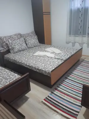 a bed sitting in a living room with a mattress at Seosko turističko domaćinstvo Stojković in Aleksinac