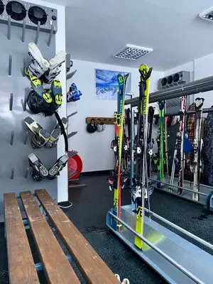 a room with a bunch of skis and ski equipment at Ski Adventure - Brzeće, Kopaonik in Kopaonik