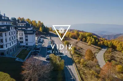 an aerial view of a house with the villa excellence logo at Vidik Residence in Kopaonik