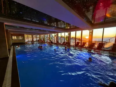 a large swimming pool with people in it at Kopaonik Milmari Mili P75 in Kopaonik