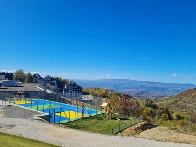a swimming pool on top of a hill at Kopaonik Milmari Mili P75 in Kopaonik