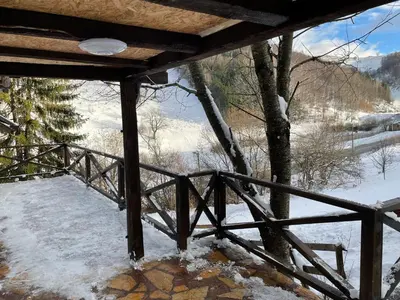 a winter view from the porch of a cabin at Dvosobni apartmani KopaNiK, Kopaonik (Brzece) in Brzeće